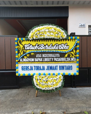 Papan Bunga Duka di Muarapayang